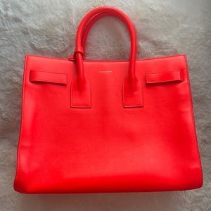 Neon orange Saint Laurent purse